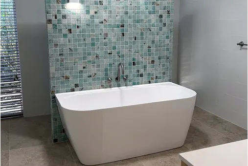 side view worker spraying powder paint from gun 1